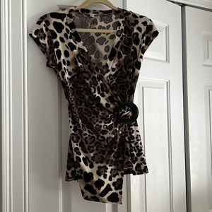 Love this animal print top with side buckle